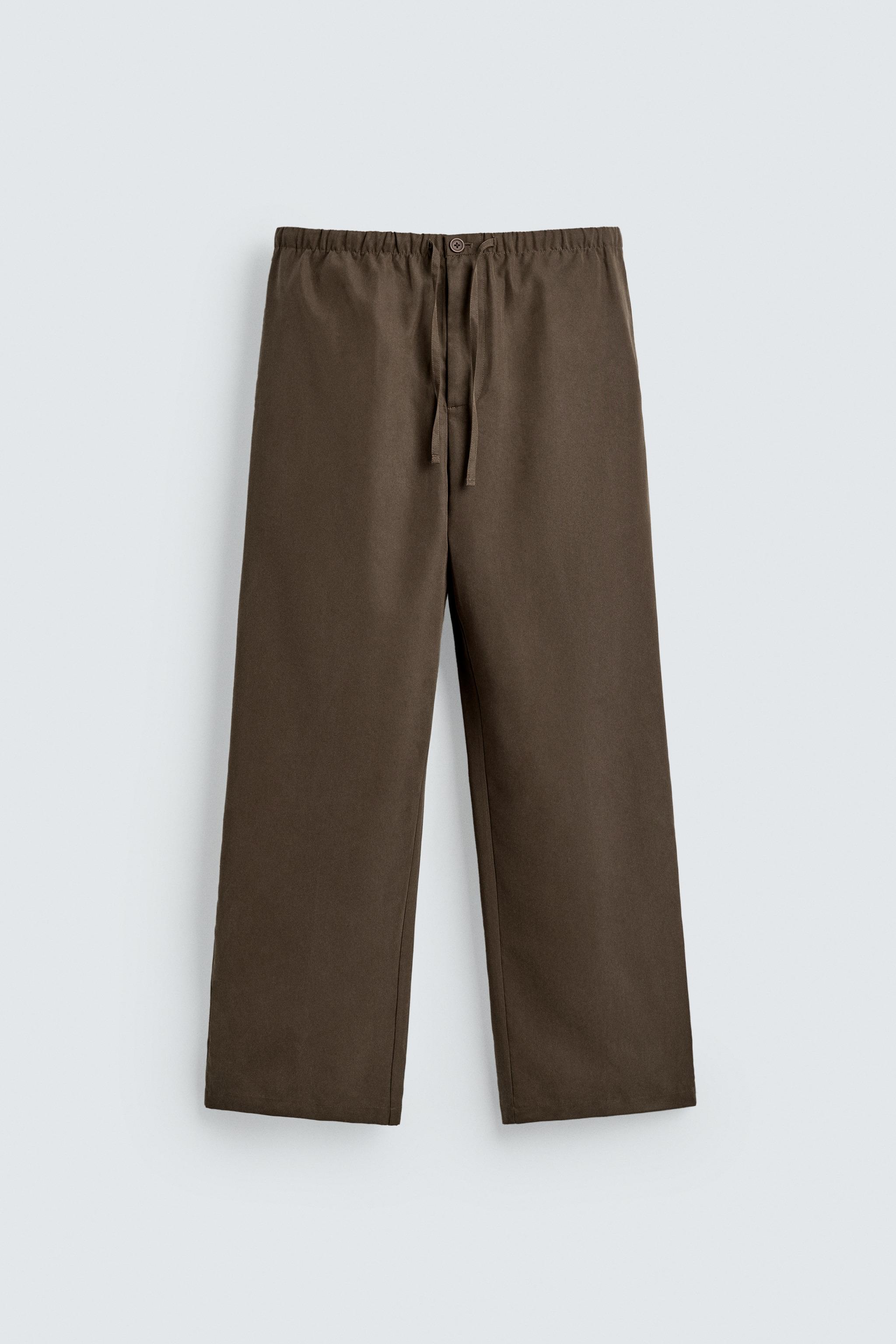 FLOWY WIDE FIT PANTS